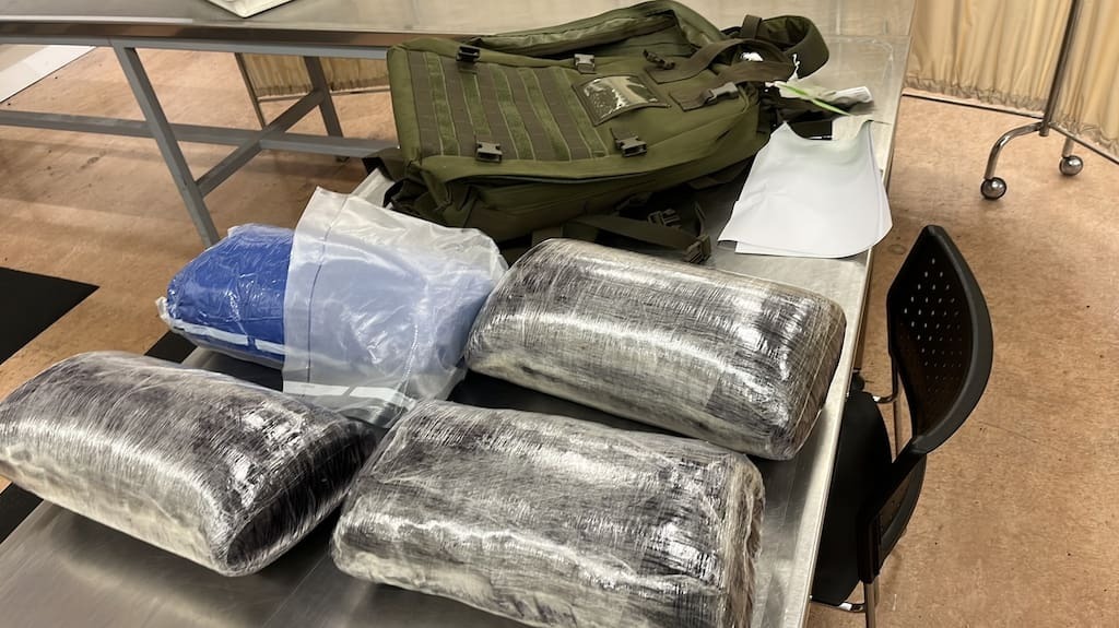 a-number-of-plastic-wrapped-vacu.jpg